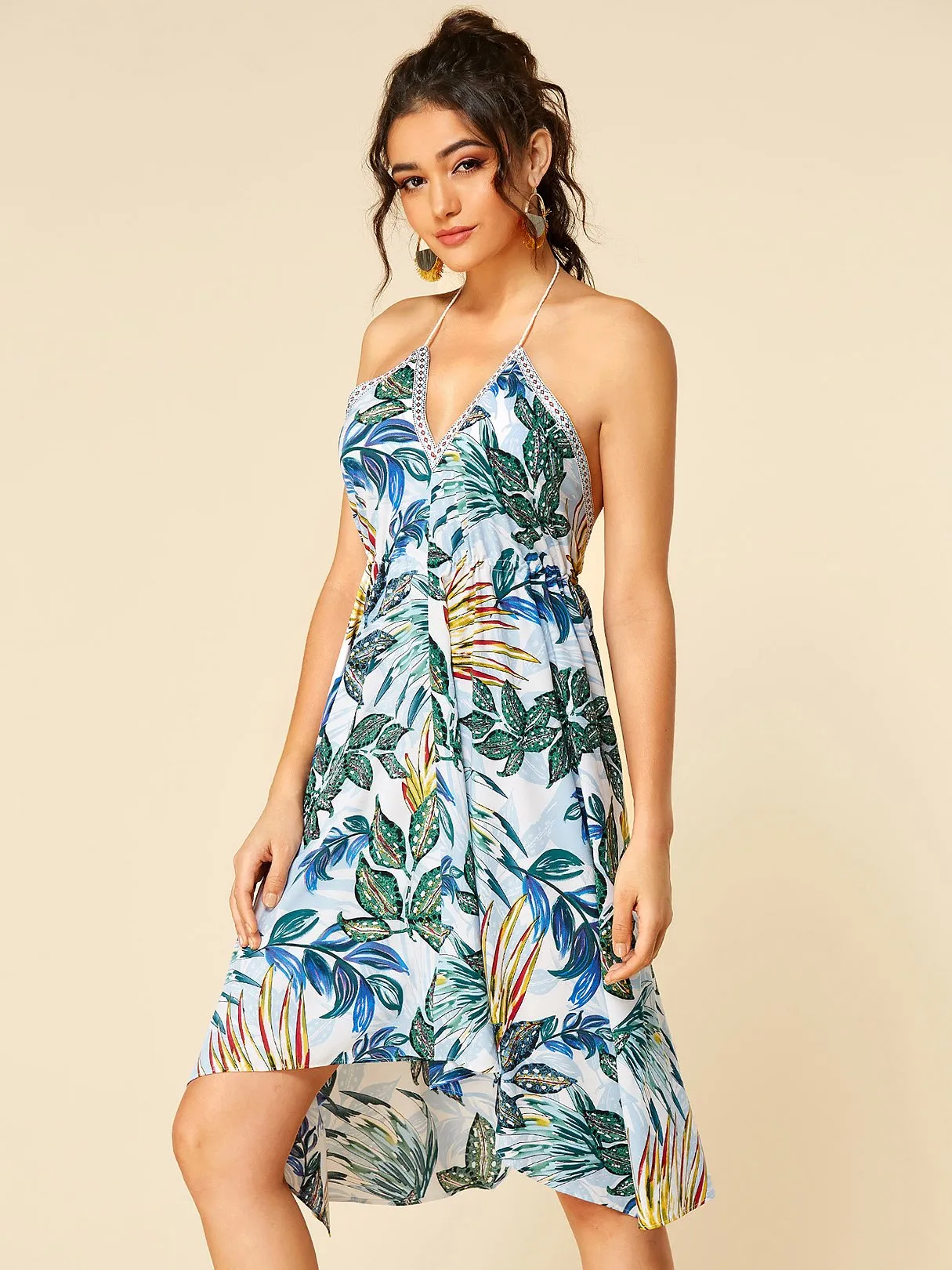 Wholesale Green V-Neck Sleeveless Printed Tassel Backless Hollow Self-Tie Handkerchief Hem Casual Dress
